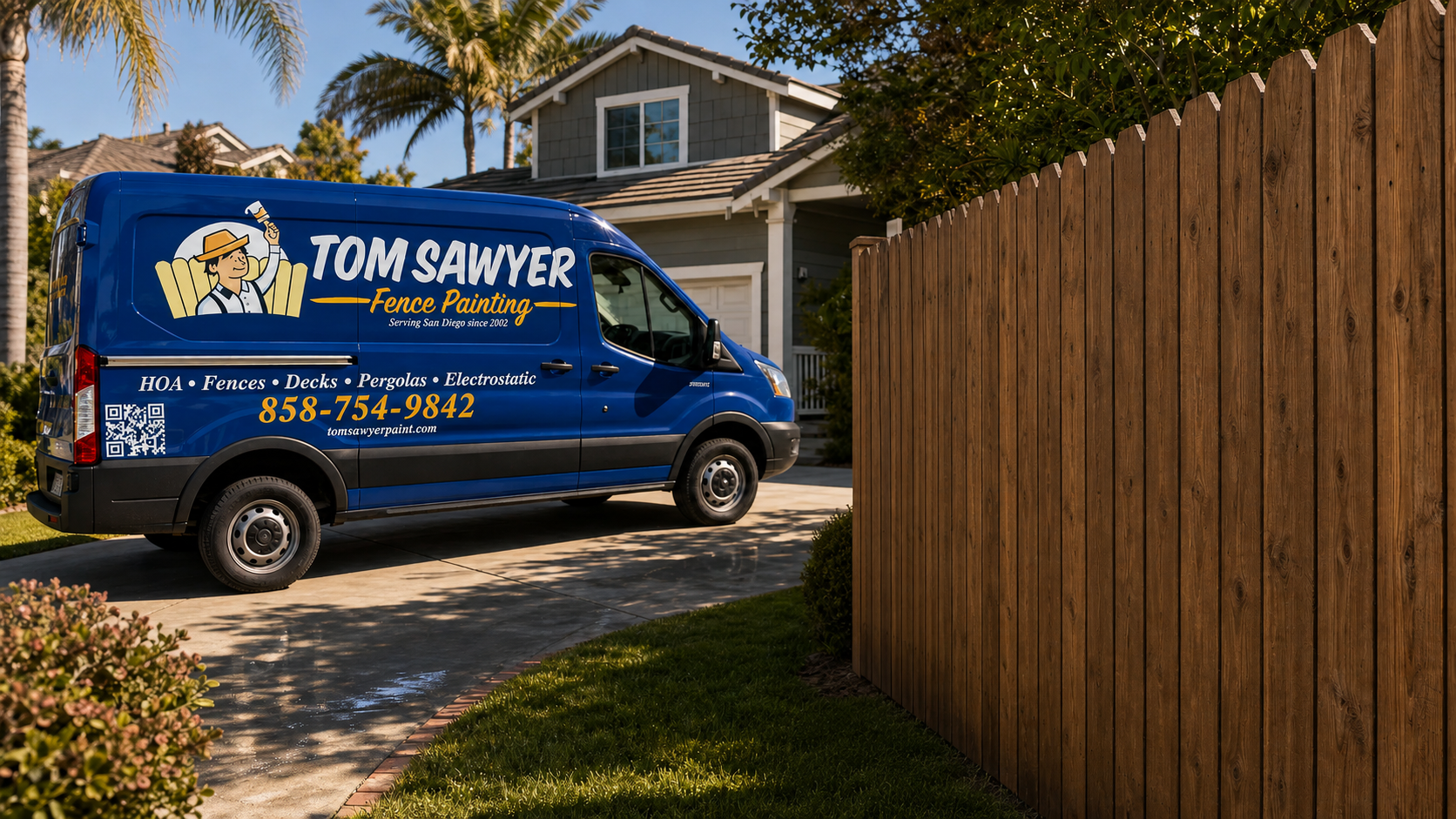 Completed chestnut-stained wood privacy fence beside a Tom Sawyer service van